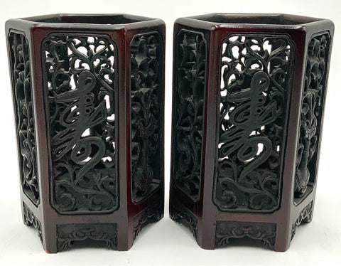 Pair of Carved Asian Candleholders