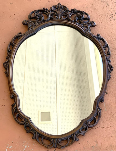 Carved Dark Wood Oval Mirror