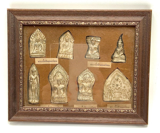 Framed Collection of Eight Thai Buddha Amulets