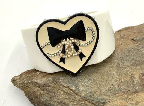 CHANEL White Resin Black Enamel Heart with Pearl CC Logo Hinged Cuff